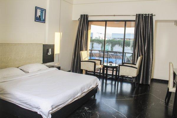 Hotel Aristro Lonavala Værelse billede